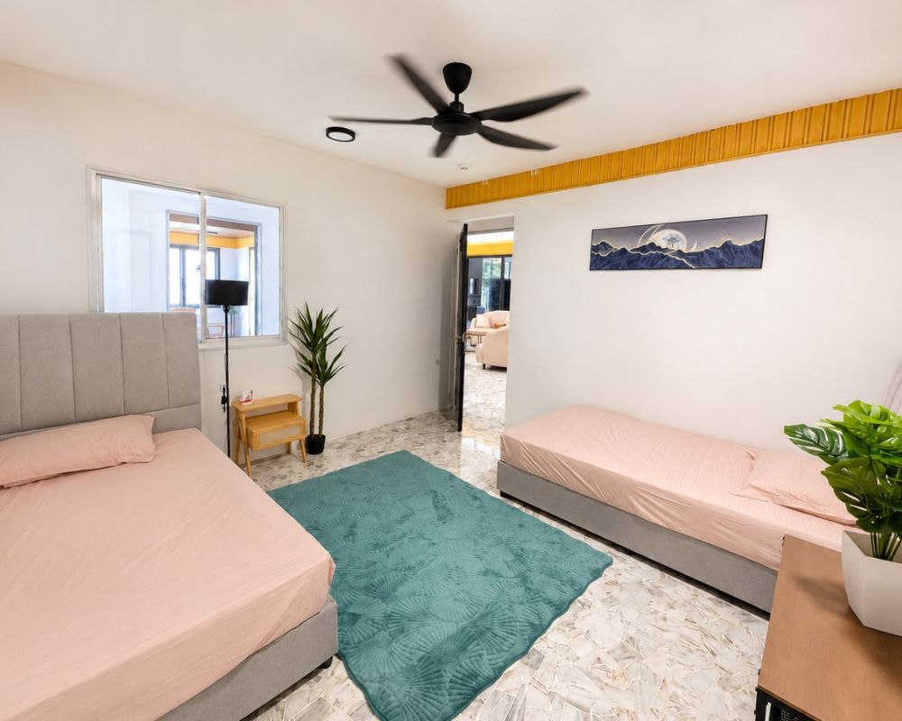 Family visiting a resident in a bright social space at Lumina Care
